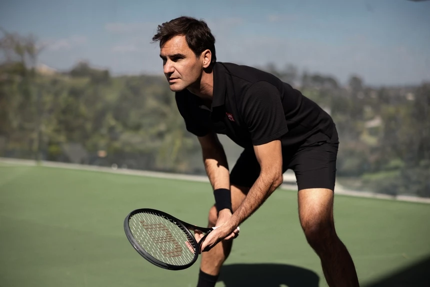 Roger Federer con racchette da tennis Wilson RF